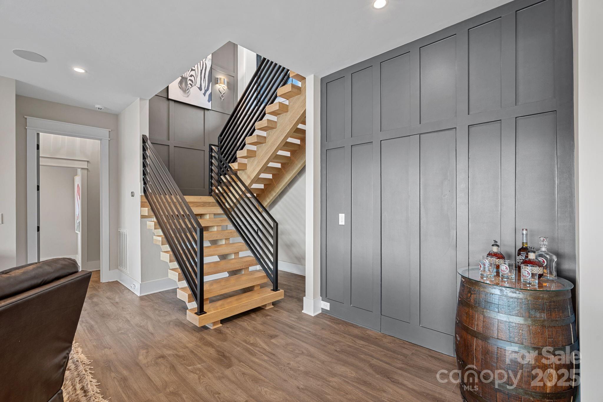 162 West Maranta Road Mooresville, NC 28117 - Photo 22 of 46 a view of a hallway with entryway wooden floor and windows
