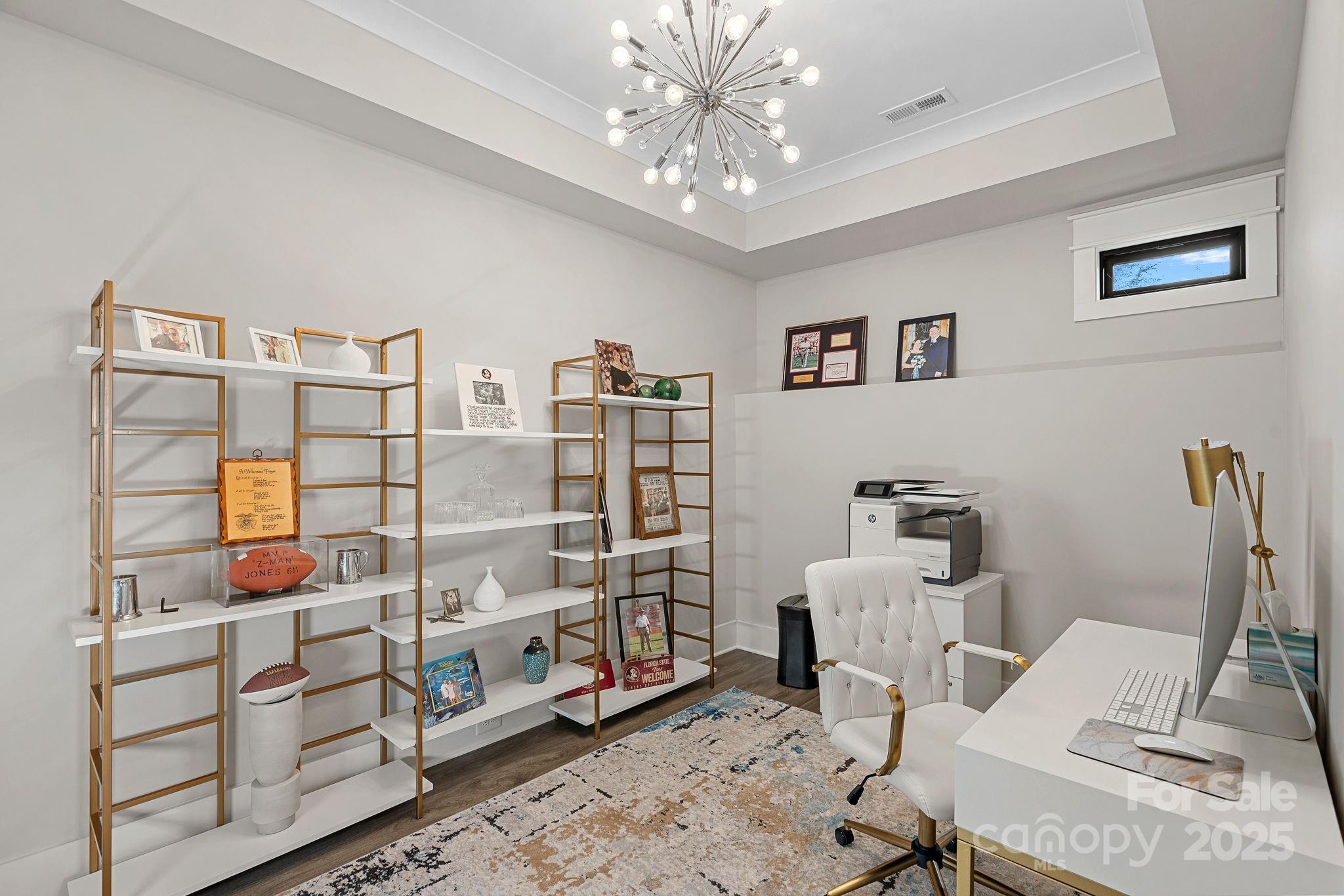 162 West Maranta Road Mooresville, NC 28117 - Photo 28 of 46 a bedroom with furniture and a chandelier