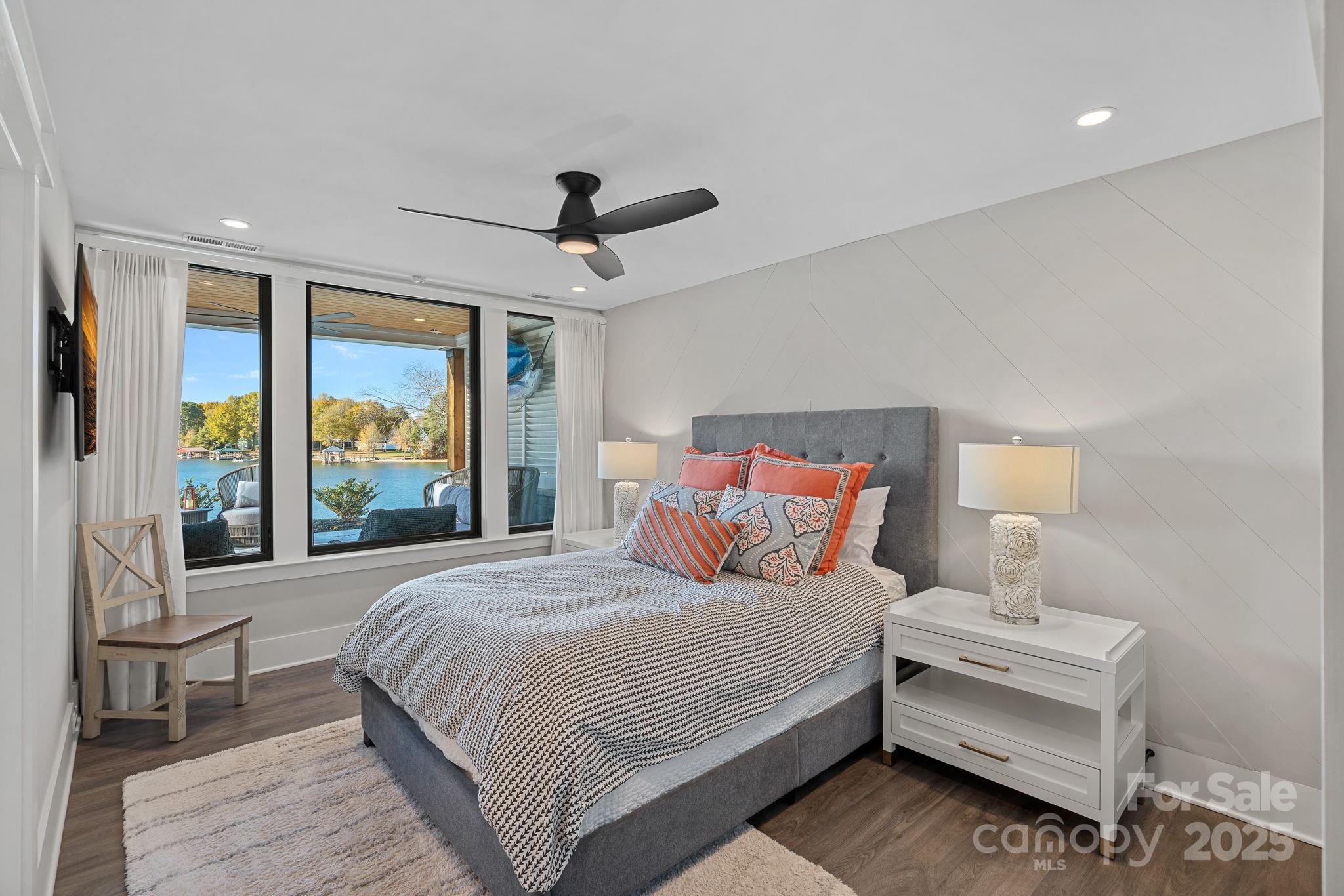 162 West Maranta Road Mooresville, NC 28117 - Photo 31 of 46 a bedroom with a large bed and a large window