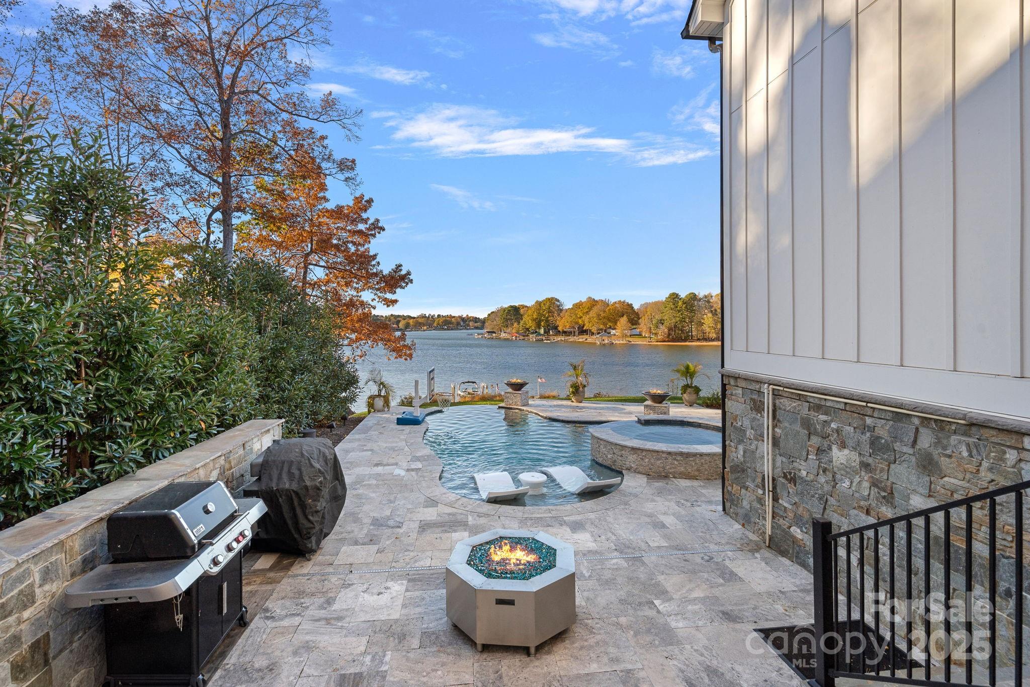 162 West Maranta Road Mooresville, NC 28117 - Photo 33 of 46 a view of roof deck with chair and tables