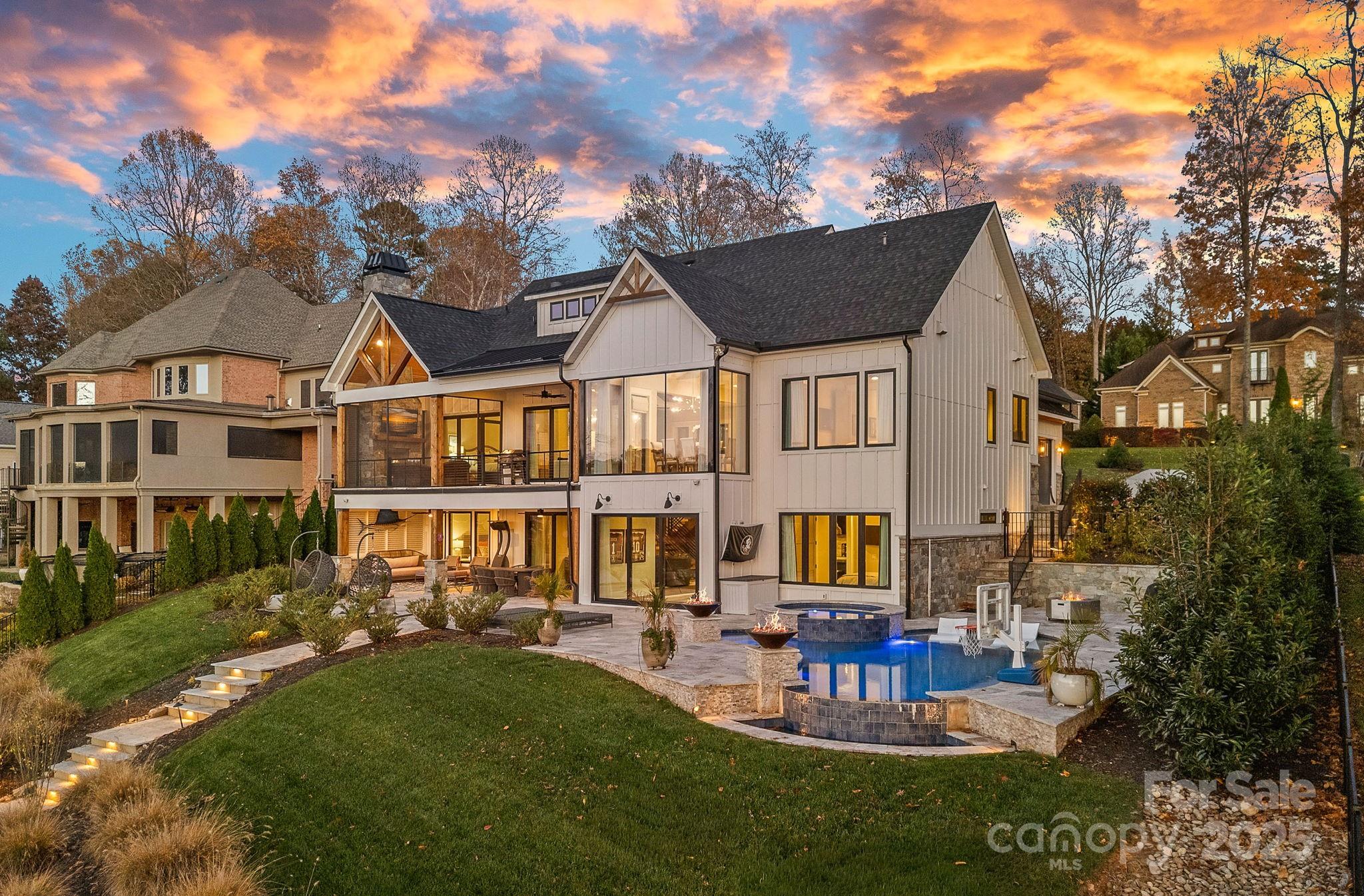 162 West Maranta Road Mooresville, NC 28117 - Photo 40 of 46 a view of house with outdoor seating and city view