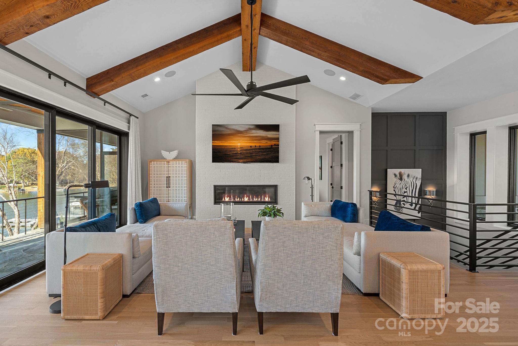 162 West Maranta Road Mooresville, NC 28117 - Photo 5 of 46 a view of a livingroom with furniture and a flat screen tv