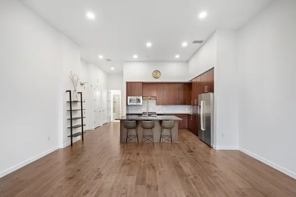 a kitchen with a table and chairs in it