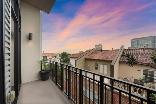 a view of a balcony with city view