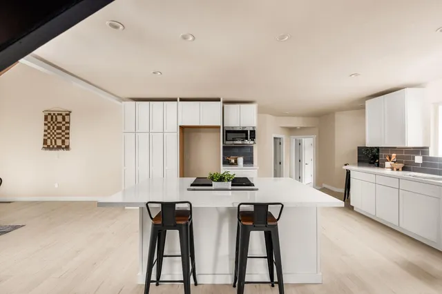 a kitchen with a sink and a window