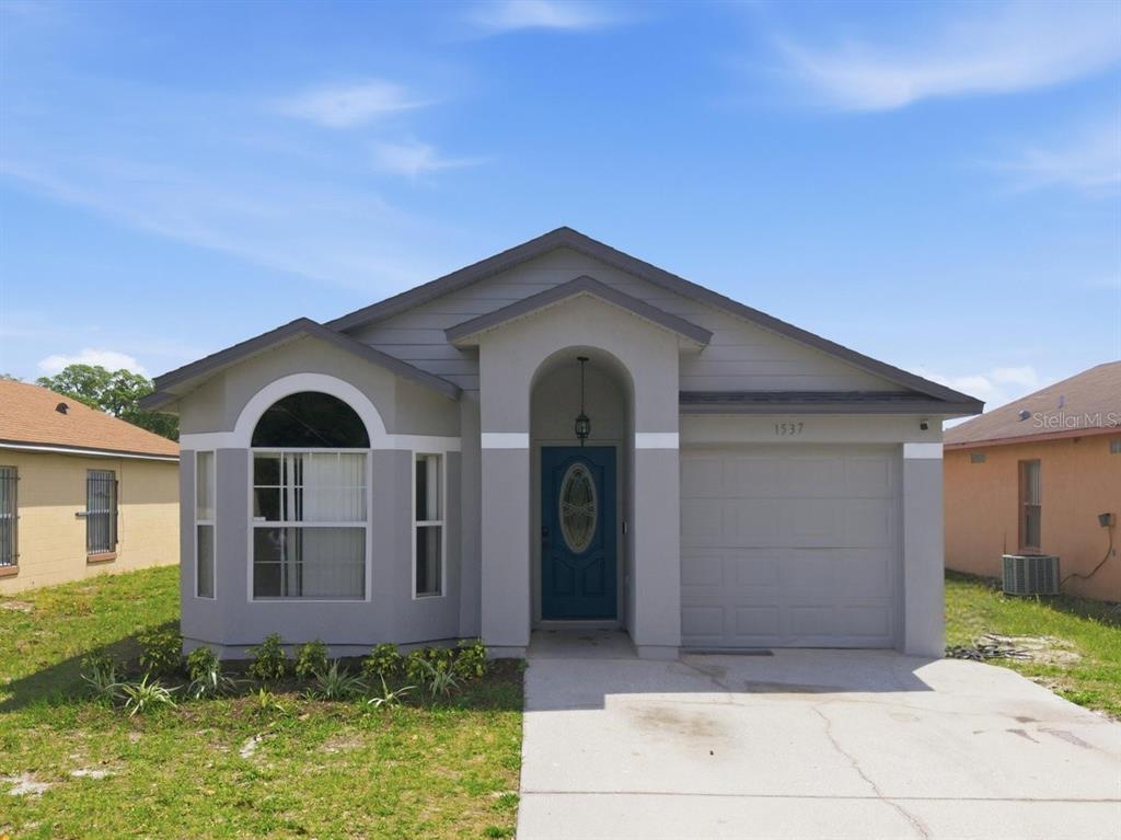 1537 Ridge Pointe Drive Orlando, FL 32808 - Photo 3 of 37