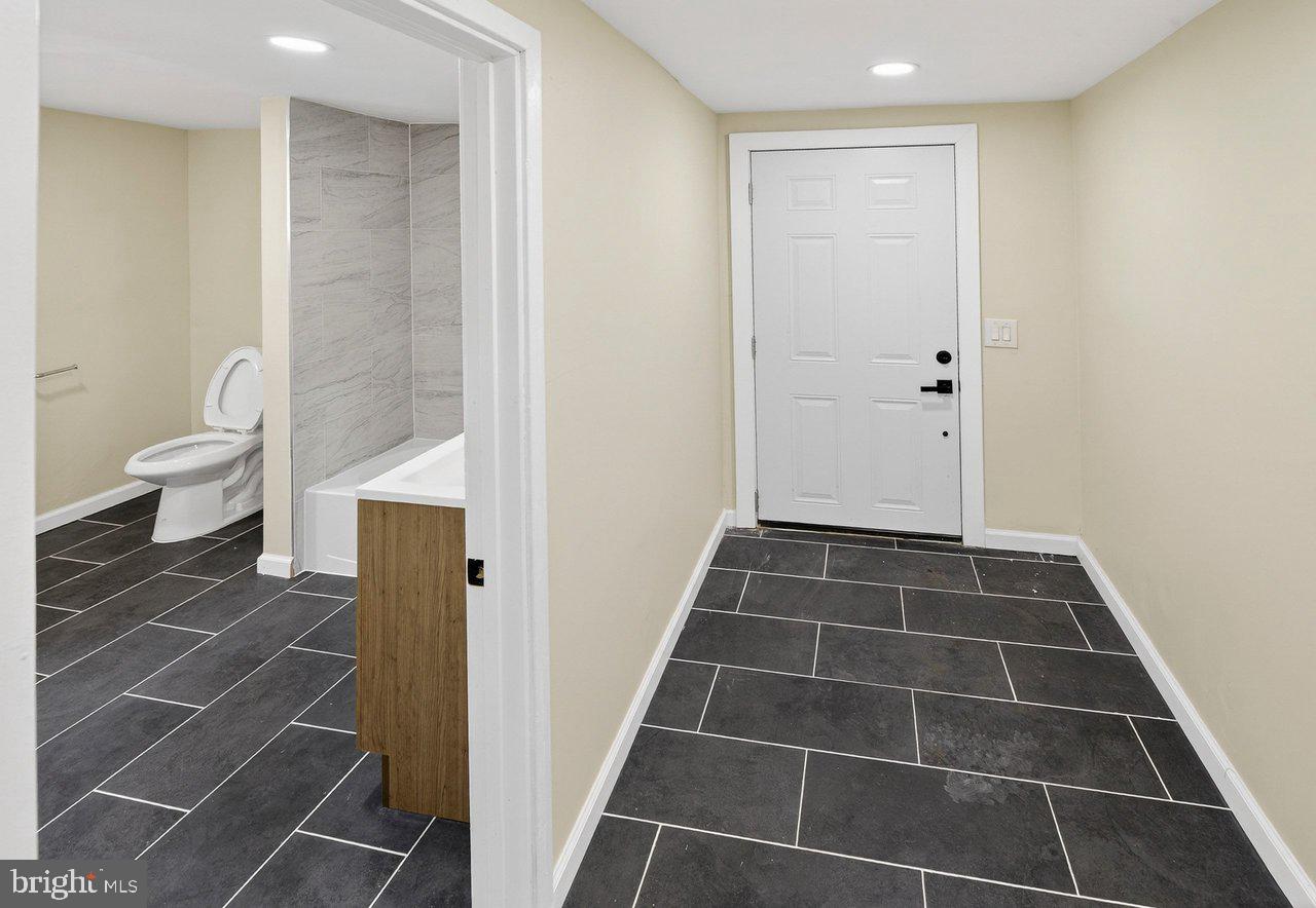 6 Olive Street Salem, NJ 08079 - Photo 11 of 15 a bathroom with a toilet and a shower