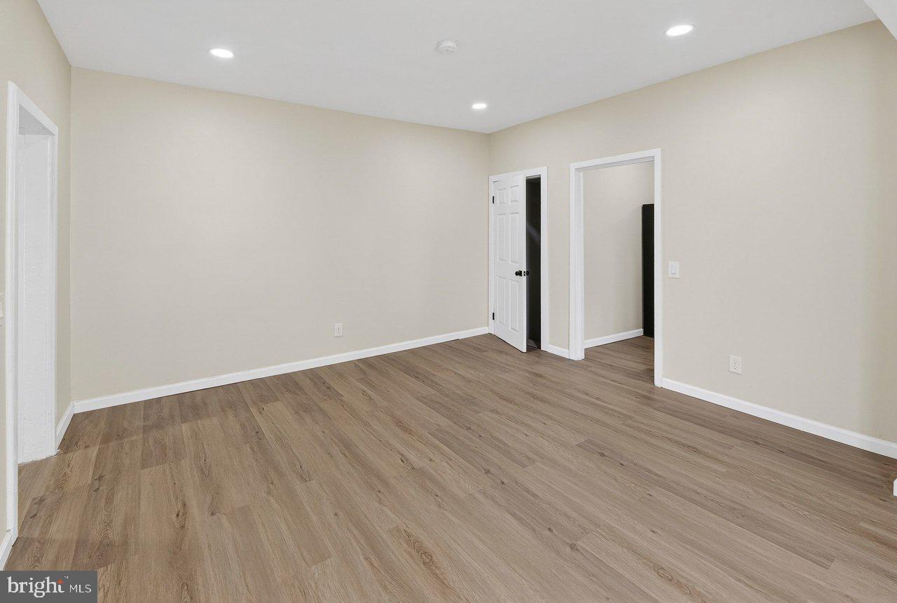 6 Olive Street Salem, NJ 08079 - Photo 14 of 15 a view of an empty room with wooden floor