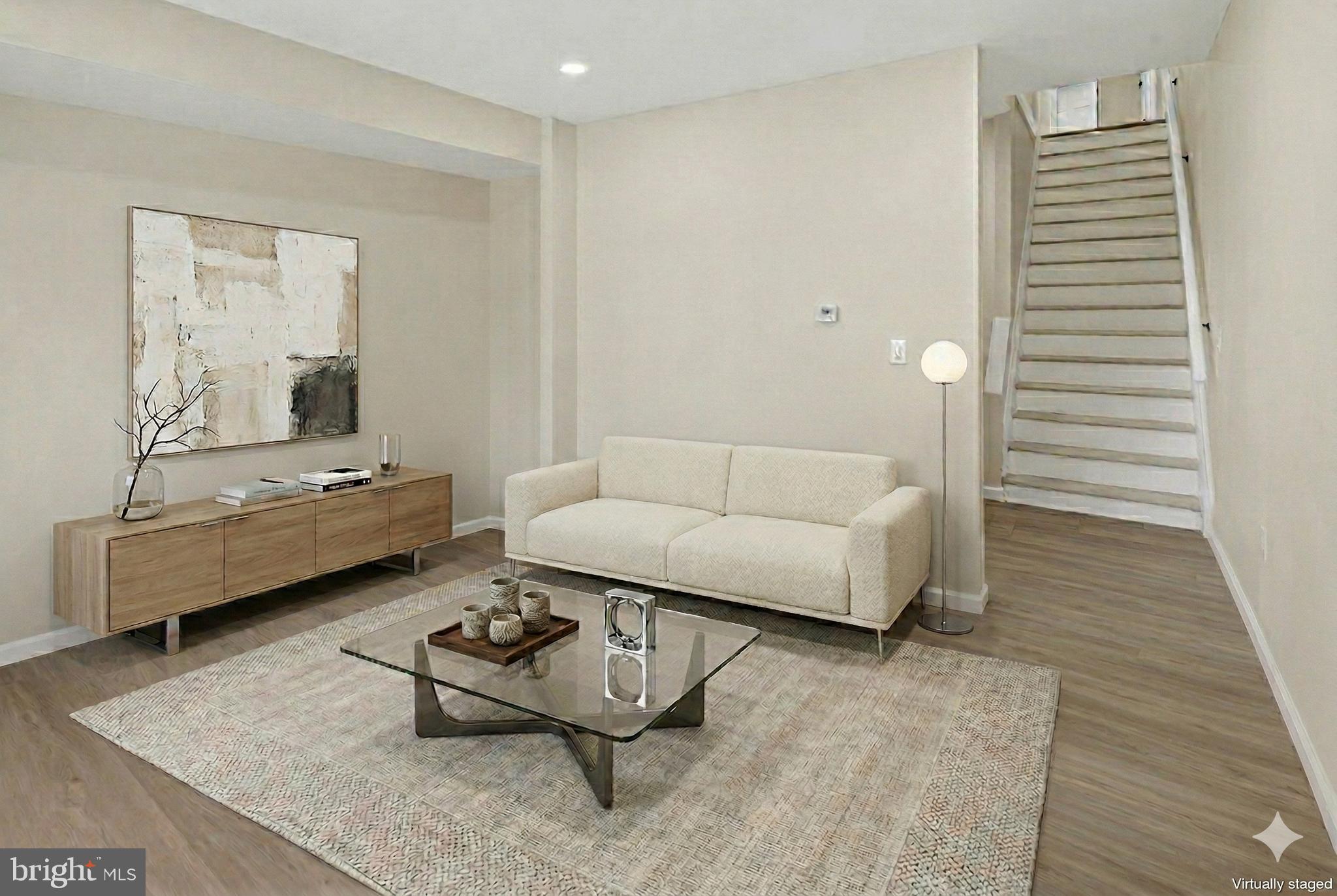 6 Olive Street Salem, NJ 08079 - Photo 4 of 15 a living room with furniture and a wooden floor