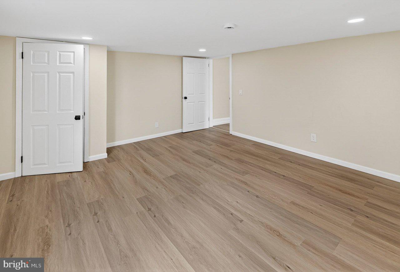 6 Olive Street Salem, NJ 08079 - Photo 9 of 15 a view of an empty room with wooden floor