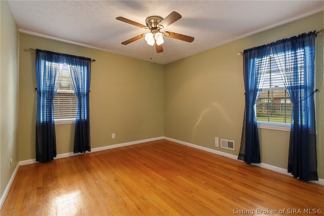 405 Hemlock Road Jeffersonville, IN 47130 - Photo 37 of 48 Beautiful Hardwoods - Also under most of the carpeted areas.