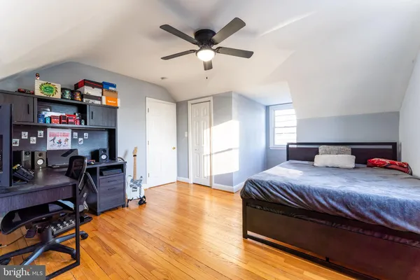 a bedroom with a bed and furniture