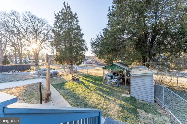 a view of a park with sitting area