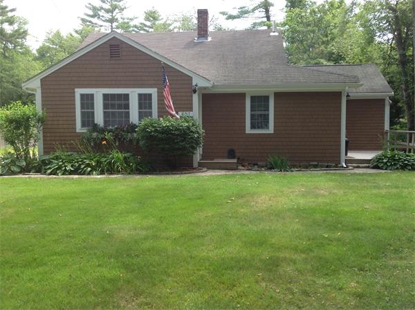 897 Point Road Marion, MA 02738 - Photo 1 of 8 a front view of a house with garden