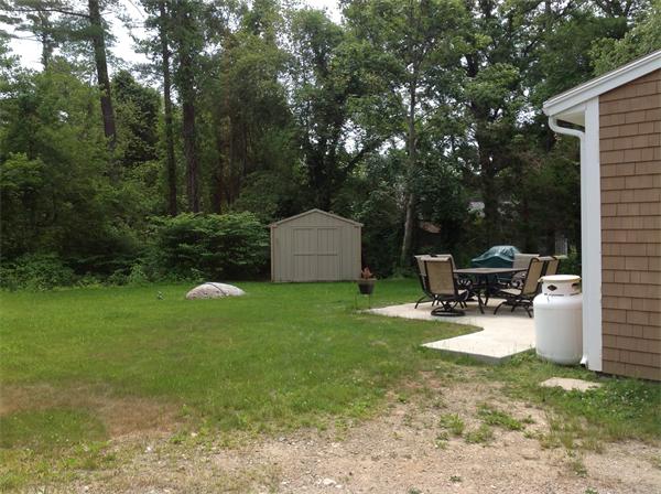 897 Point Road Marion, MA 02738 - Photo 8 of 8 a view of a house with backyard and sitting area