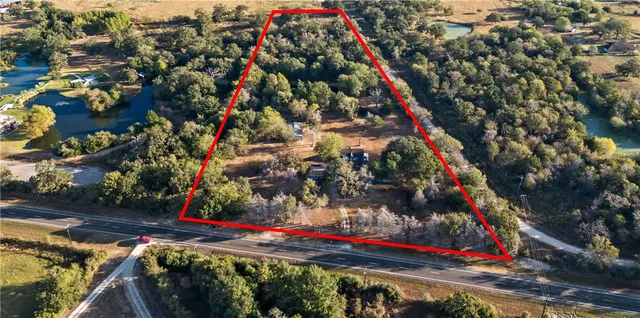 a house with trees in the background