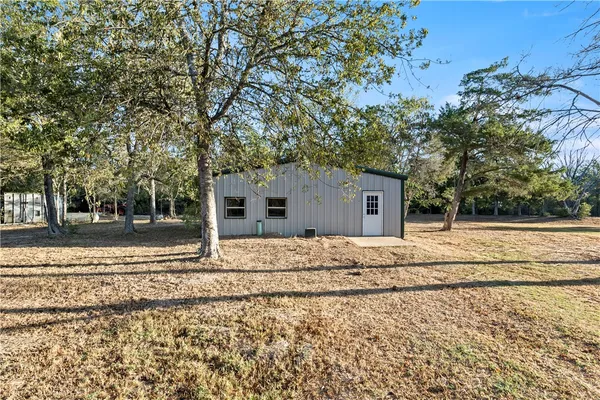 a view of outdoor space and yard