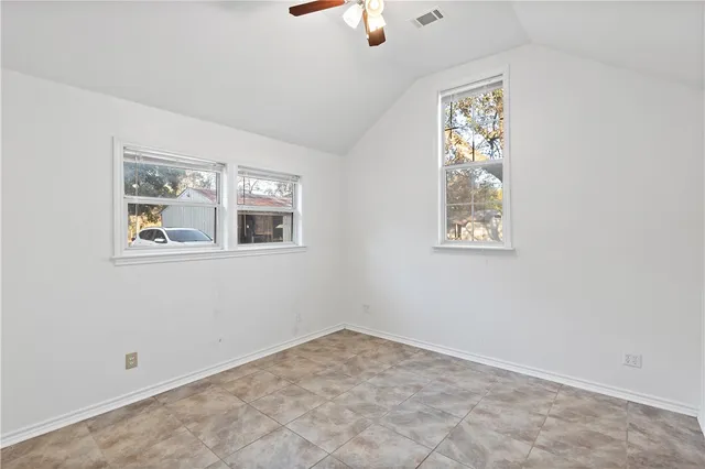 a view of a lake with a yard