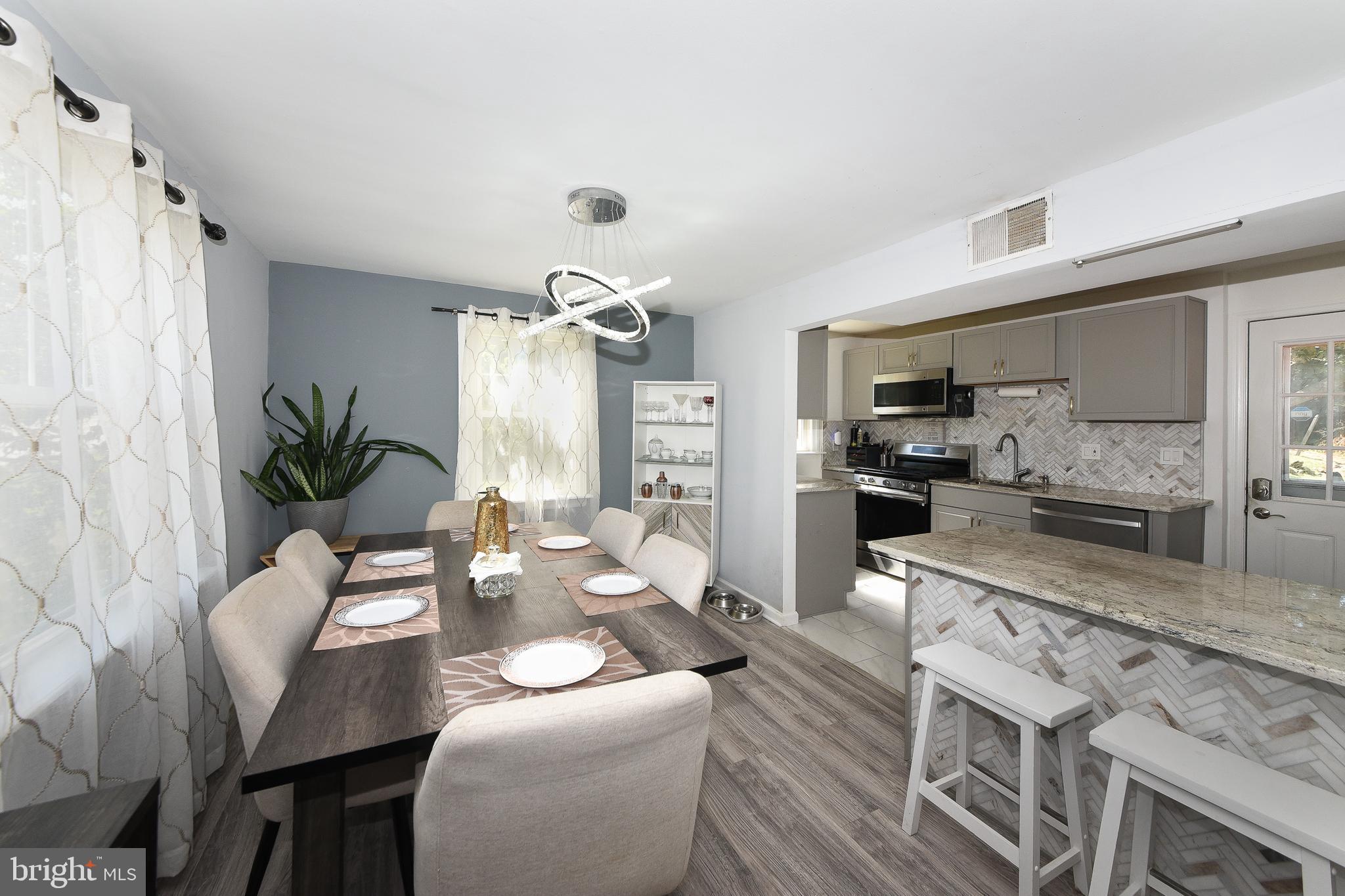 1014 North York Road Willow Grove, PA 19090 - Photo 12 of 33 a dining room with furniture and wooden floor