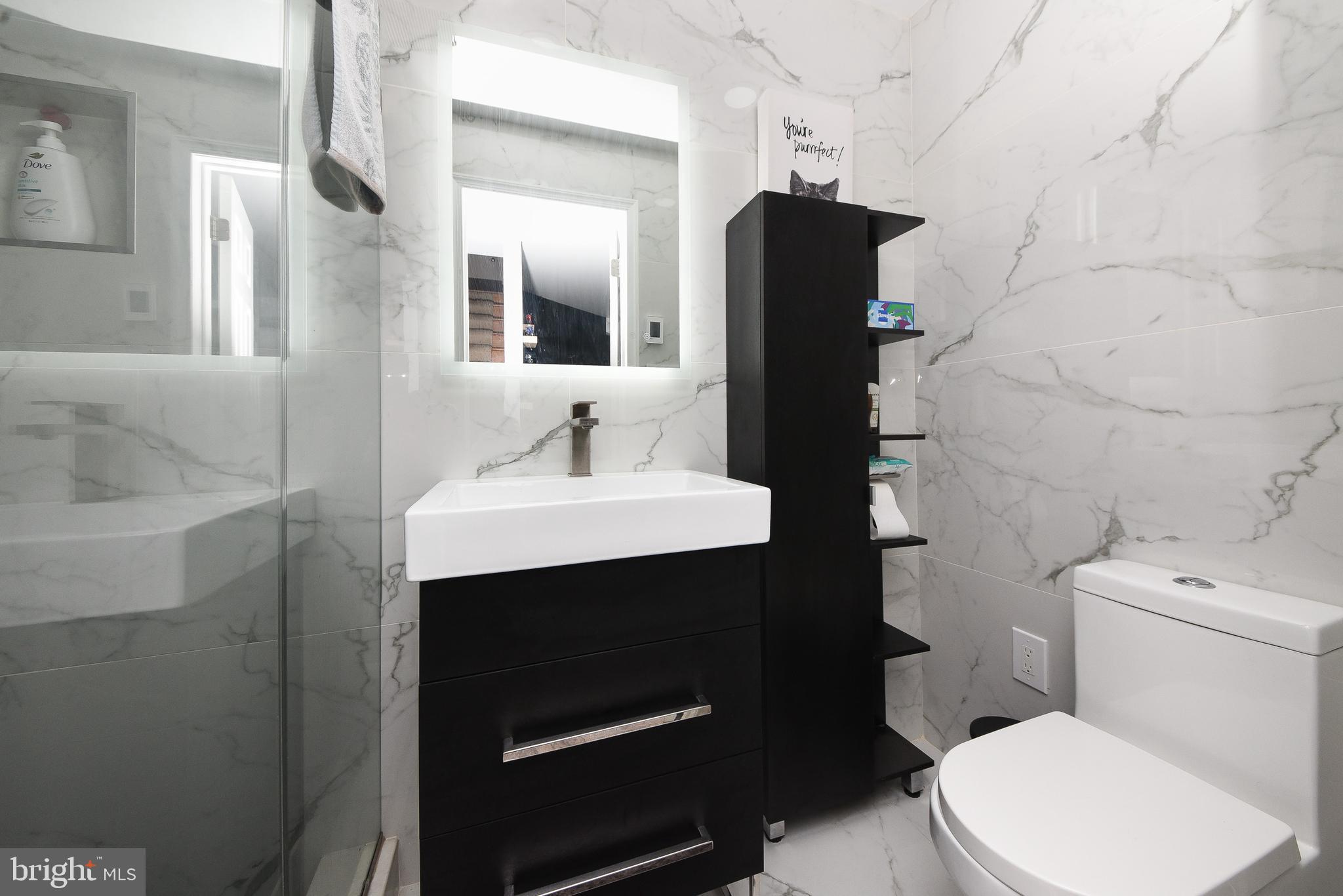 1014 North York Road Willow Grove, PA 19090 - Photo 13 of 33 a bathroom with a sink toilet and mirror