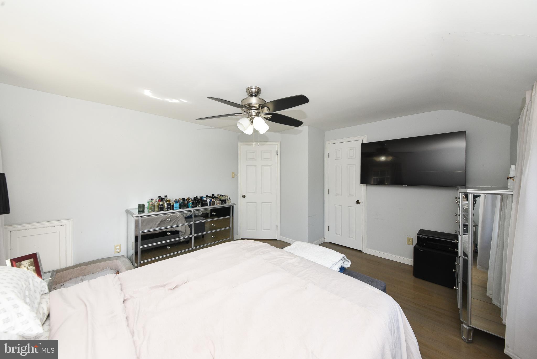 1014 North York Road Willow Grove, PA 19090 - Photo 18 of 33 a bedroom with a bed and a flat screen tv