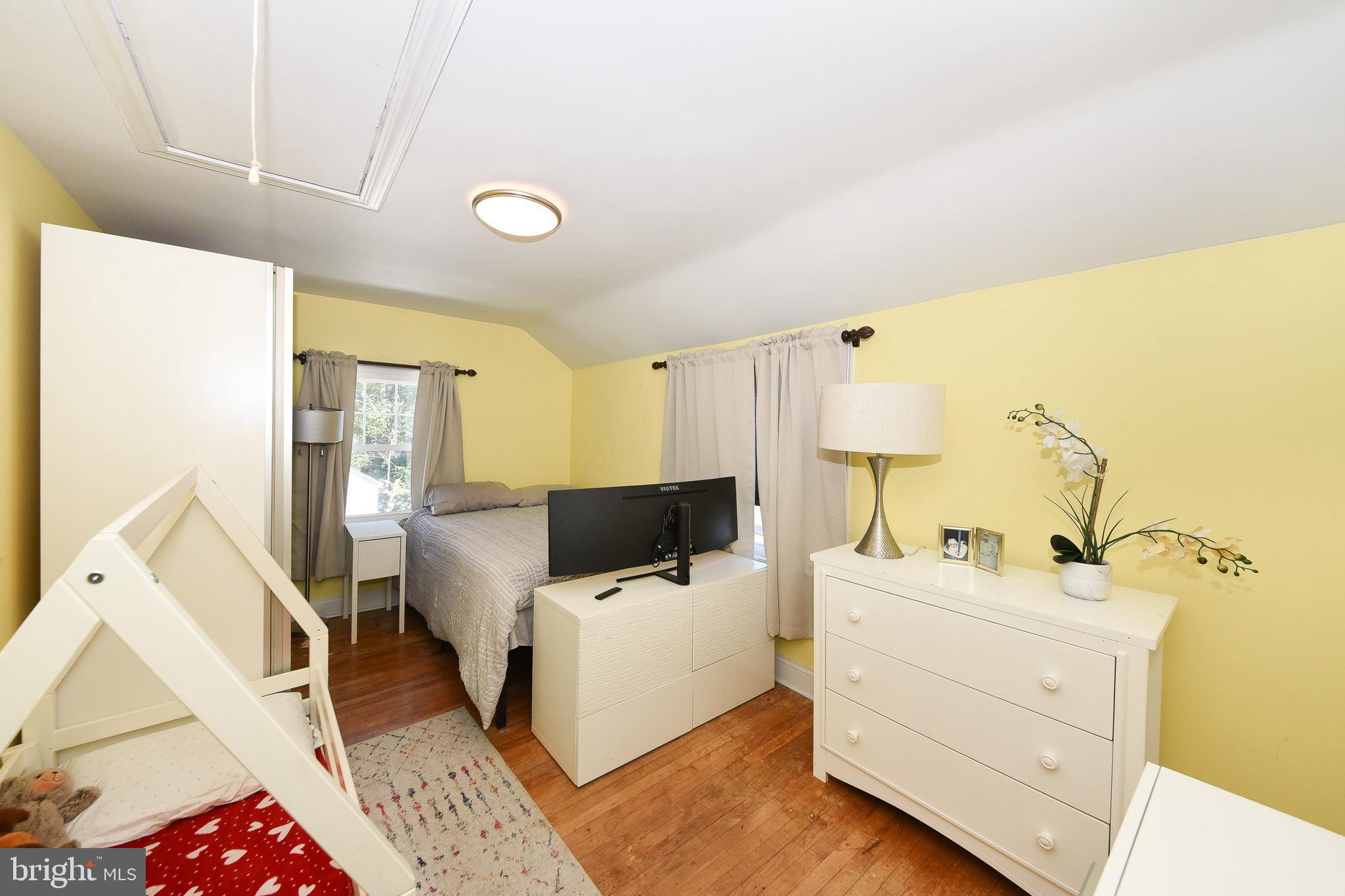 1014 North York Road Willow Grove, PA 19090 - Photo 19 of 33 a room with a bed and a night stand