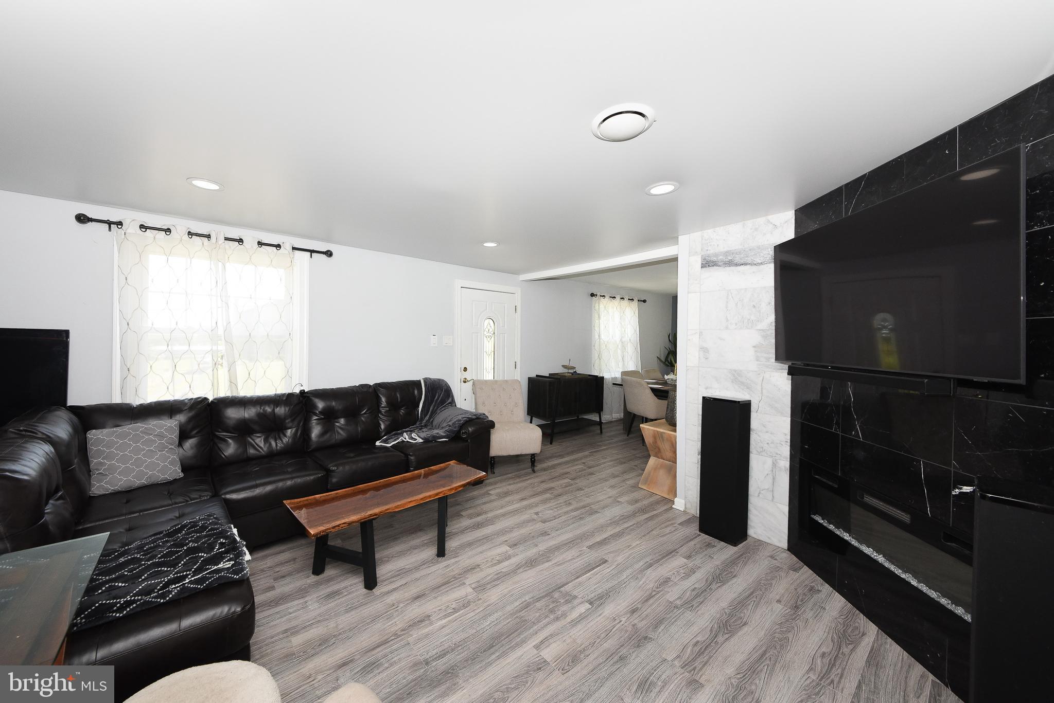1014 North York Road Willow Grove, PA 19090 - Photo 5 of 33 a living room with furniture and a flat screen tv