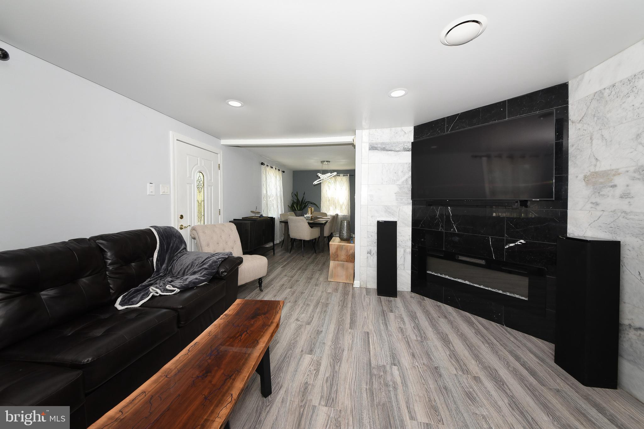 1014 North York Road Willow Grove, PA 19090 - Photo 6 of 33 a living room with furniture and a flat screen tv