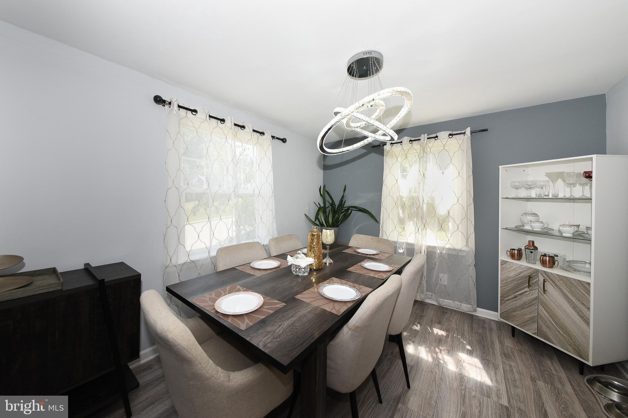 1014 North York Road Willow Grove, PA 19090 - Photo 7 of 33 a view of a dining room with furniture window and wooden floor