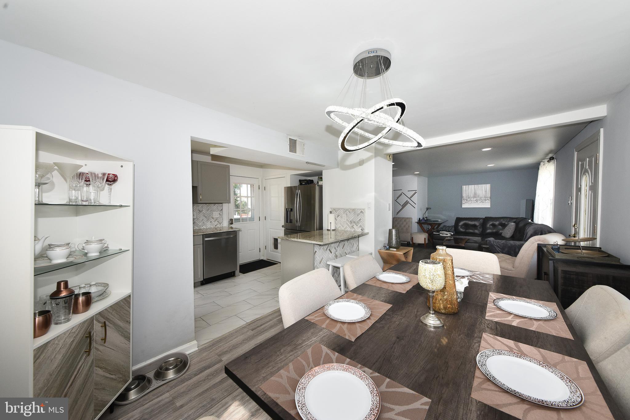 1014 North York Road Willow Grove, PA 19090 - Photo 8 of 33 a view of a dining room with furniture and wooden floor