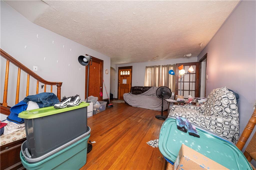 44 Forest Grove Road Coraopolis, PA 15108 - Photo 4 of 29 a living room with furniture and a wooden floor