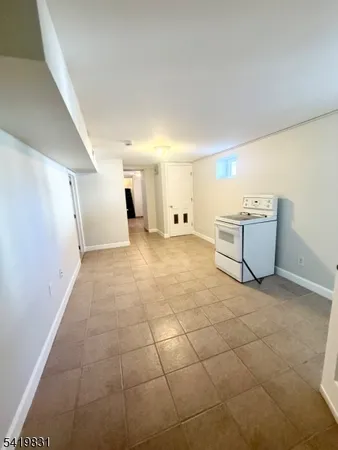 a view of a kitchen with storage and utility