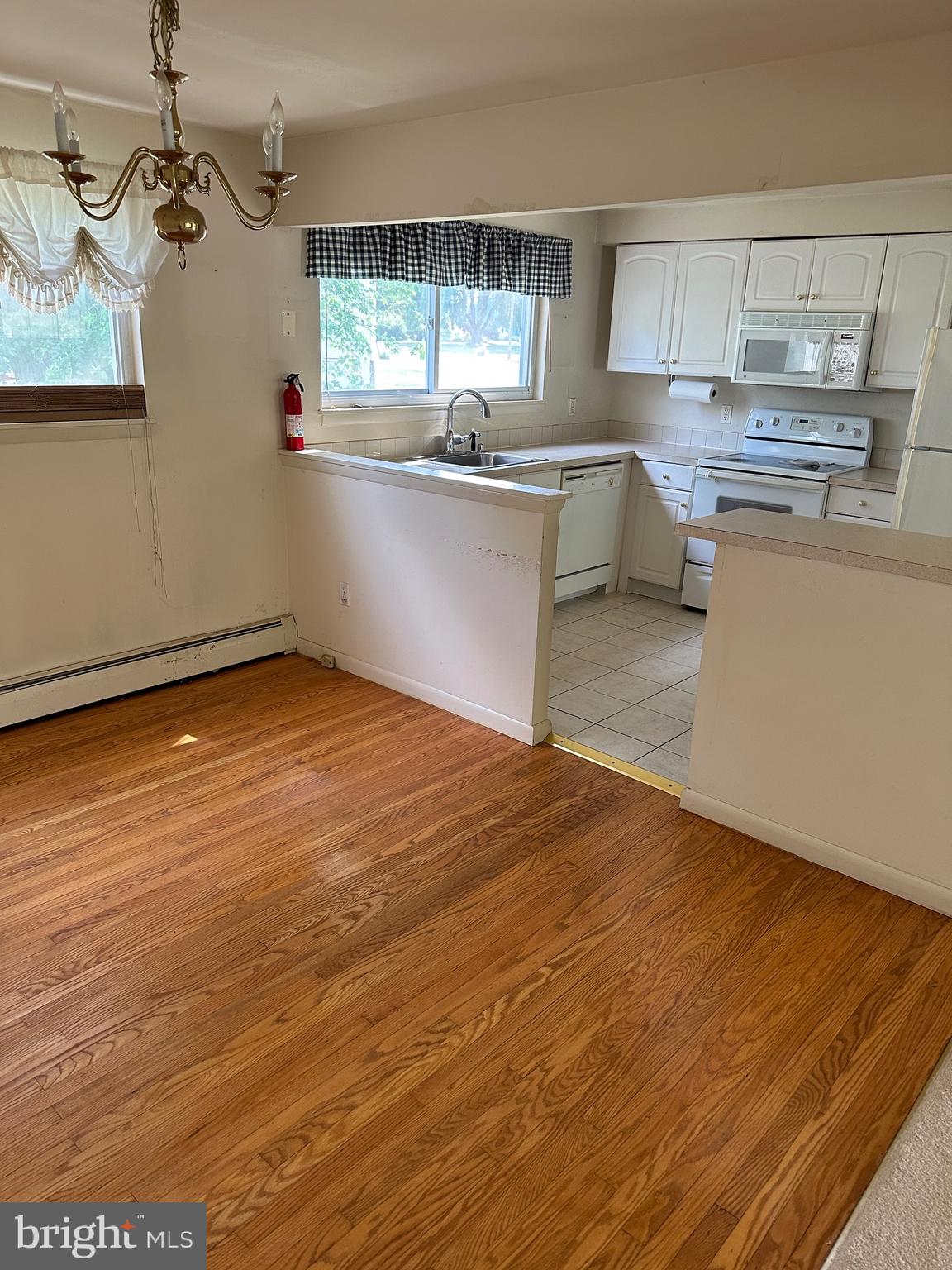 133 Inland Road Warminster, PA 18974 - Photo 6 of 10 a kitchen with stainless steel appliances granite countertop a sink window and cabinets