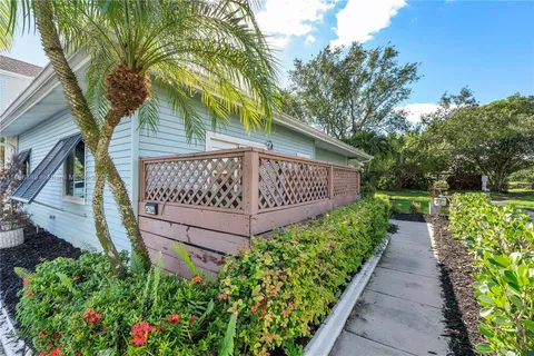 a view of a pathway in front of house