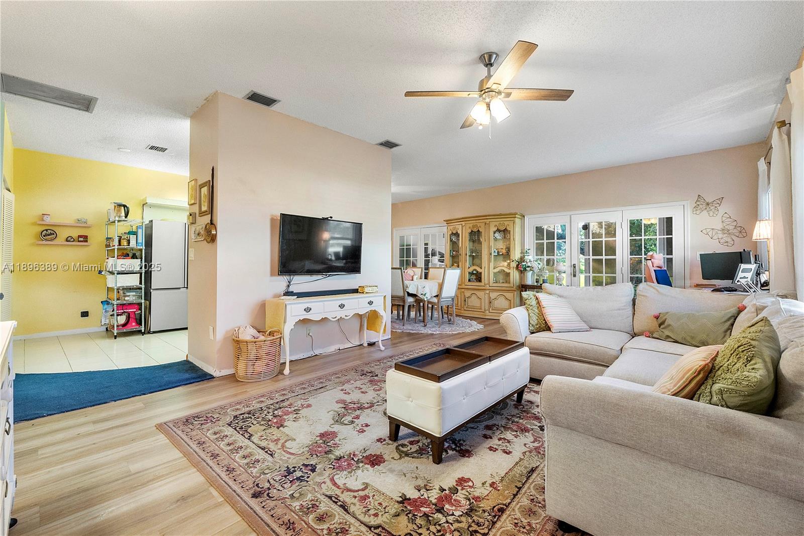 4764 South Hemingway Circle Margate, FL 33063 - Photo 5 of 30 a living room with furniture and a flat screen tv
