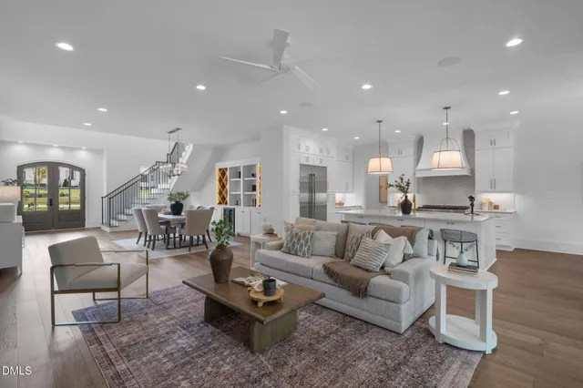 a kitchen with cabinets and stainless steel appliances