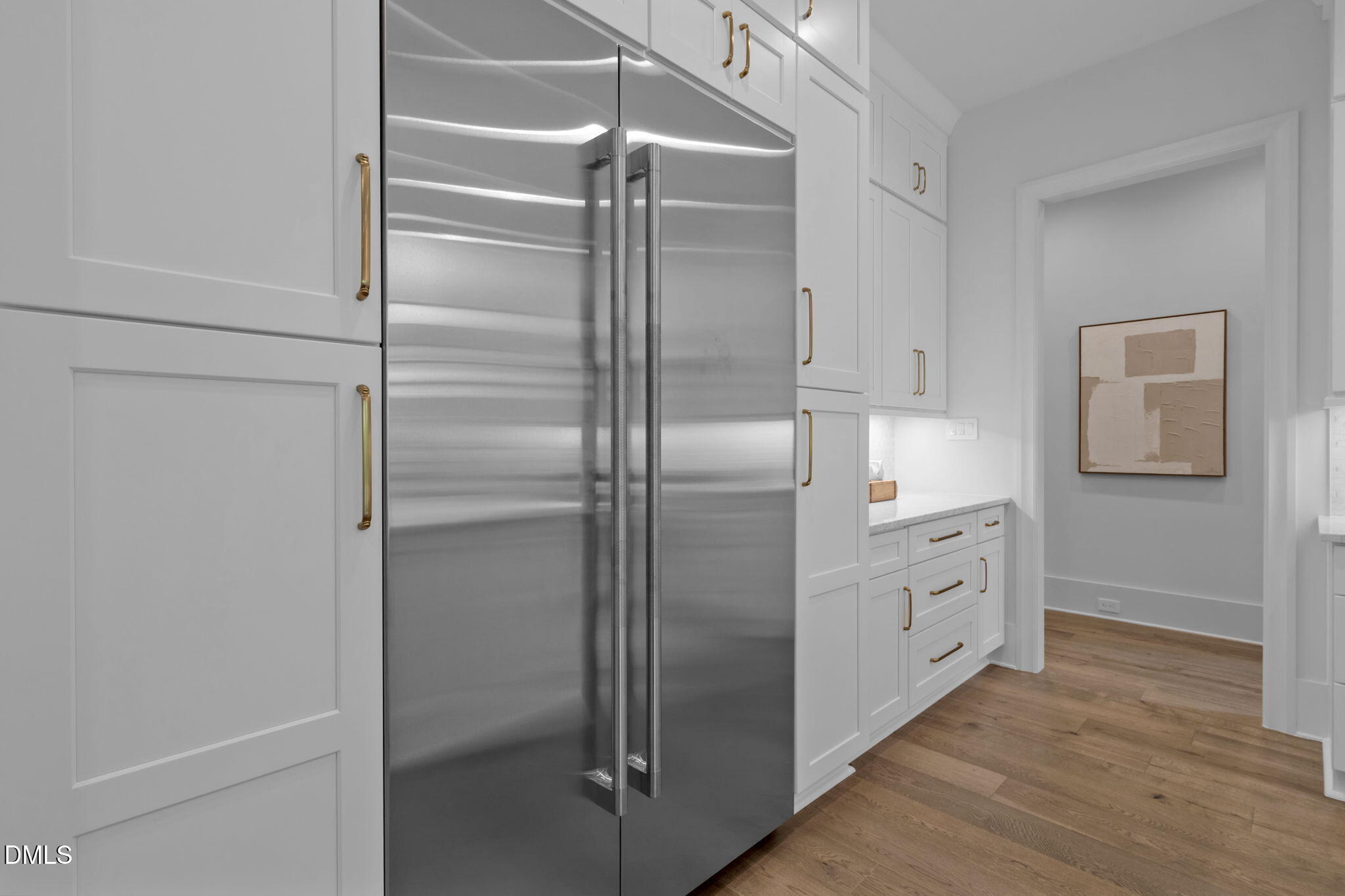 1609 Legacy Ridge Lane Wake Forest, NC 27587 - Photo 22 of 71 a kitchen with cabinets and stainless steel appliances