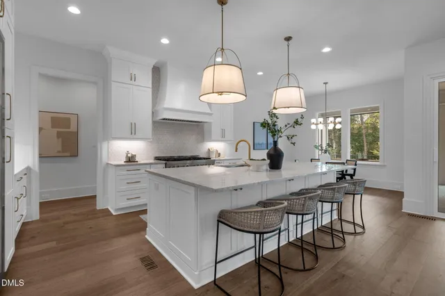 a bathroom with a tub and a shower