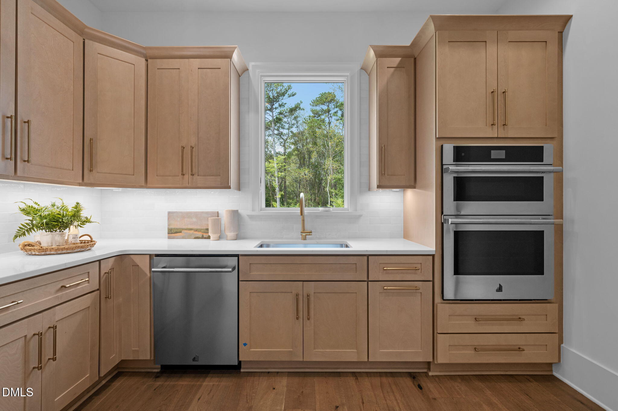 1609 Legacy Ridge Lane Wake Forest, NC 27587 - Photo 28 of 71 a kitchen with a sink cabinets and appliances