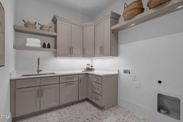 en empty room with chandelier fan