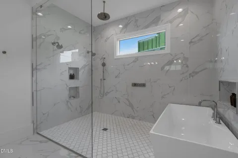 a front view of house with yard and outdoor seating