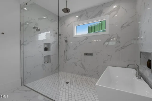 a front view of house with yard and outdoor seating