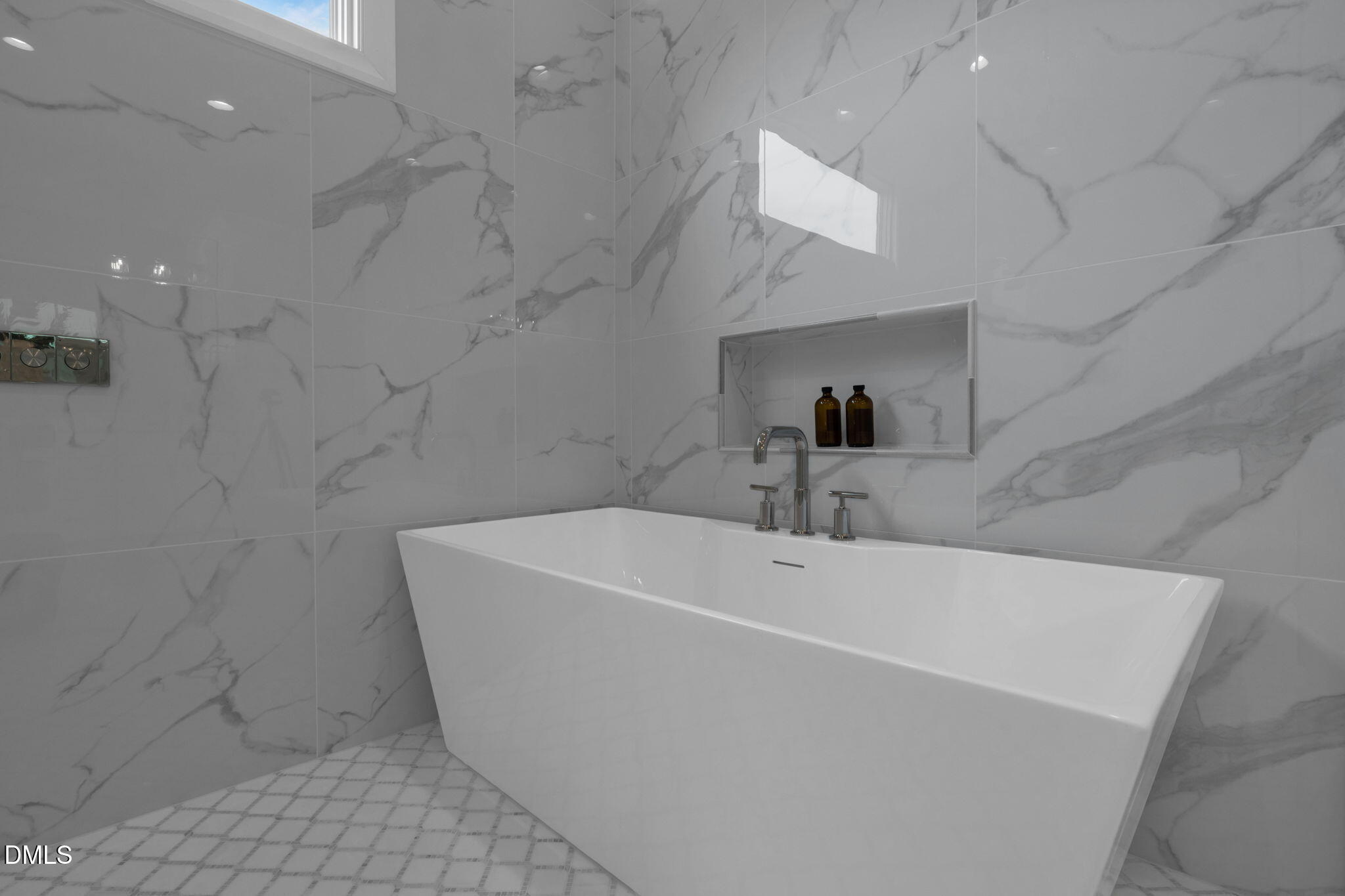 1609 Legacy Ridge Lane Wake Forest, NC 27587 - Photo 40 of 71 a bathroom with a tub and a shower