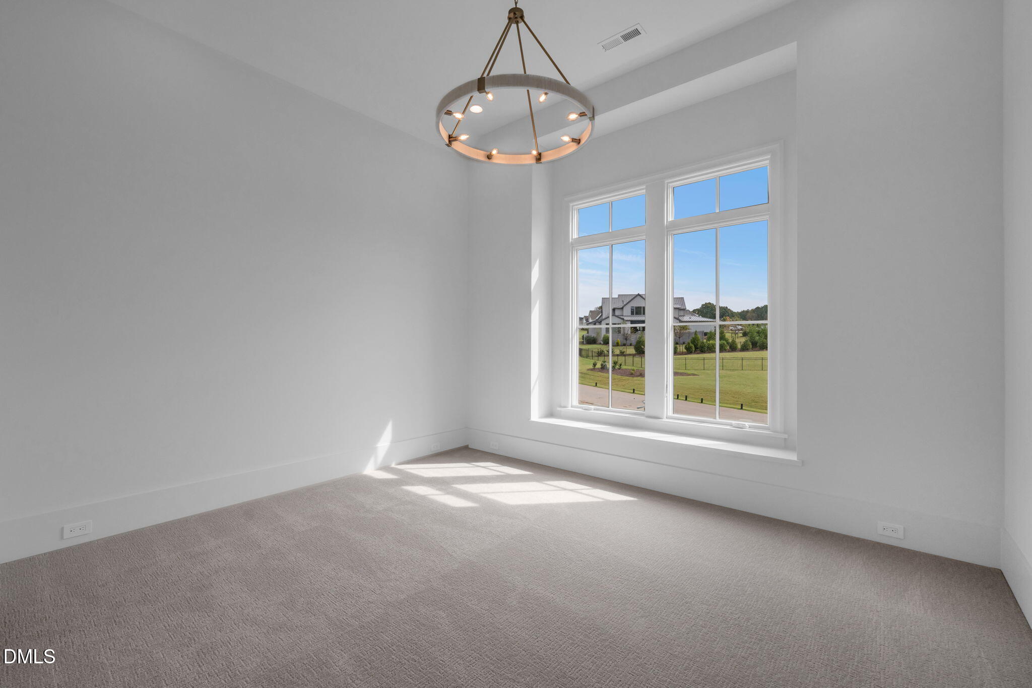 1609 Legacy Ridge Lane Wake Forest, NC 27587 - Photo 48 of 71 an empty room with a window