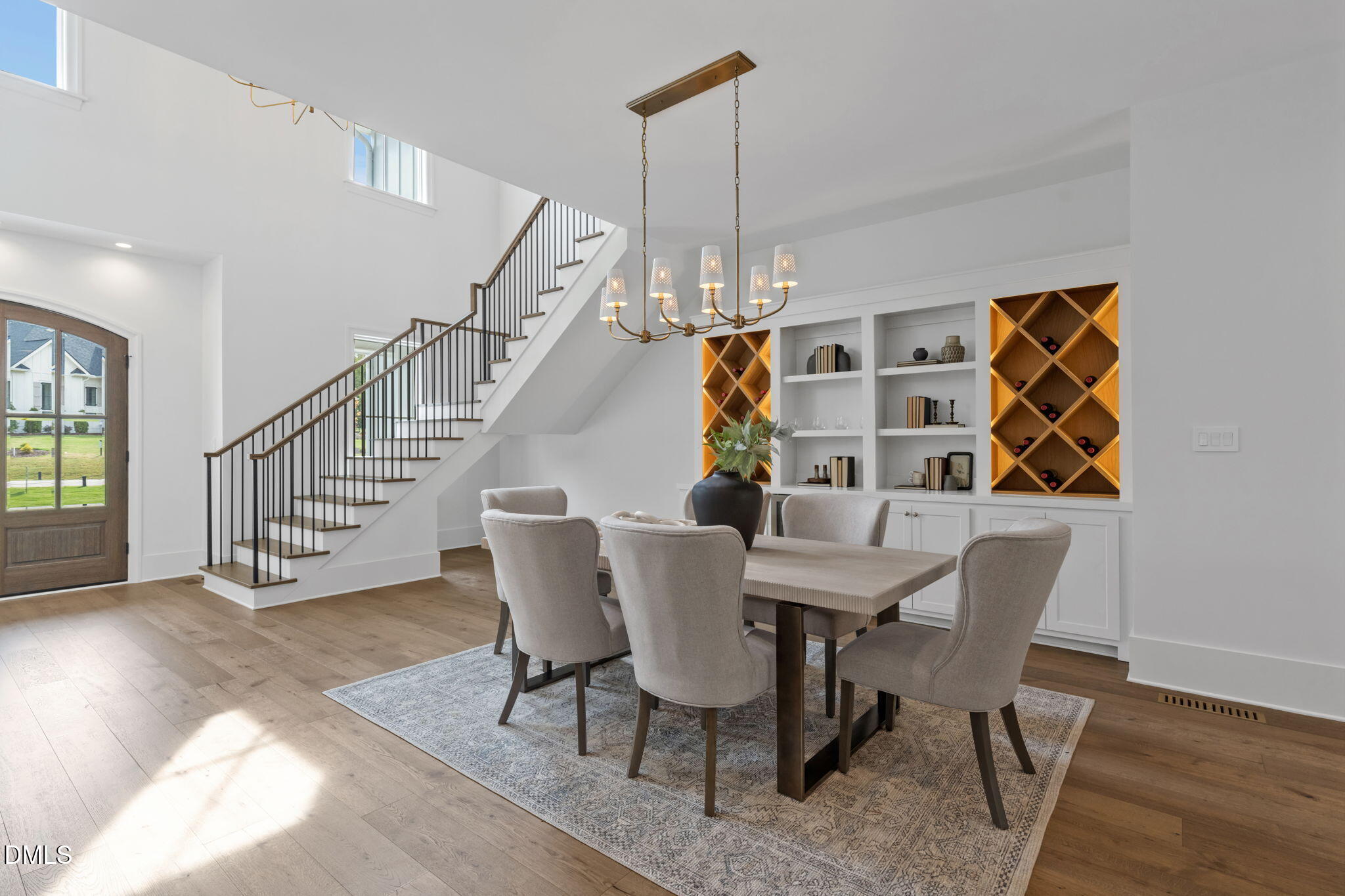 1609 Legacy Ridge Lane Wake Forest, NC 27587 - Photo 10 of 71 a view of a dining room with furniture and wooden floor