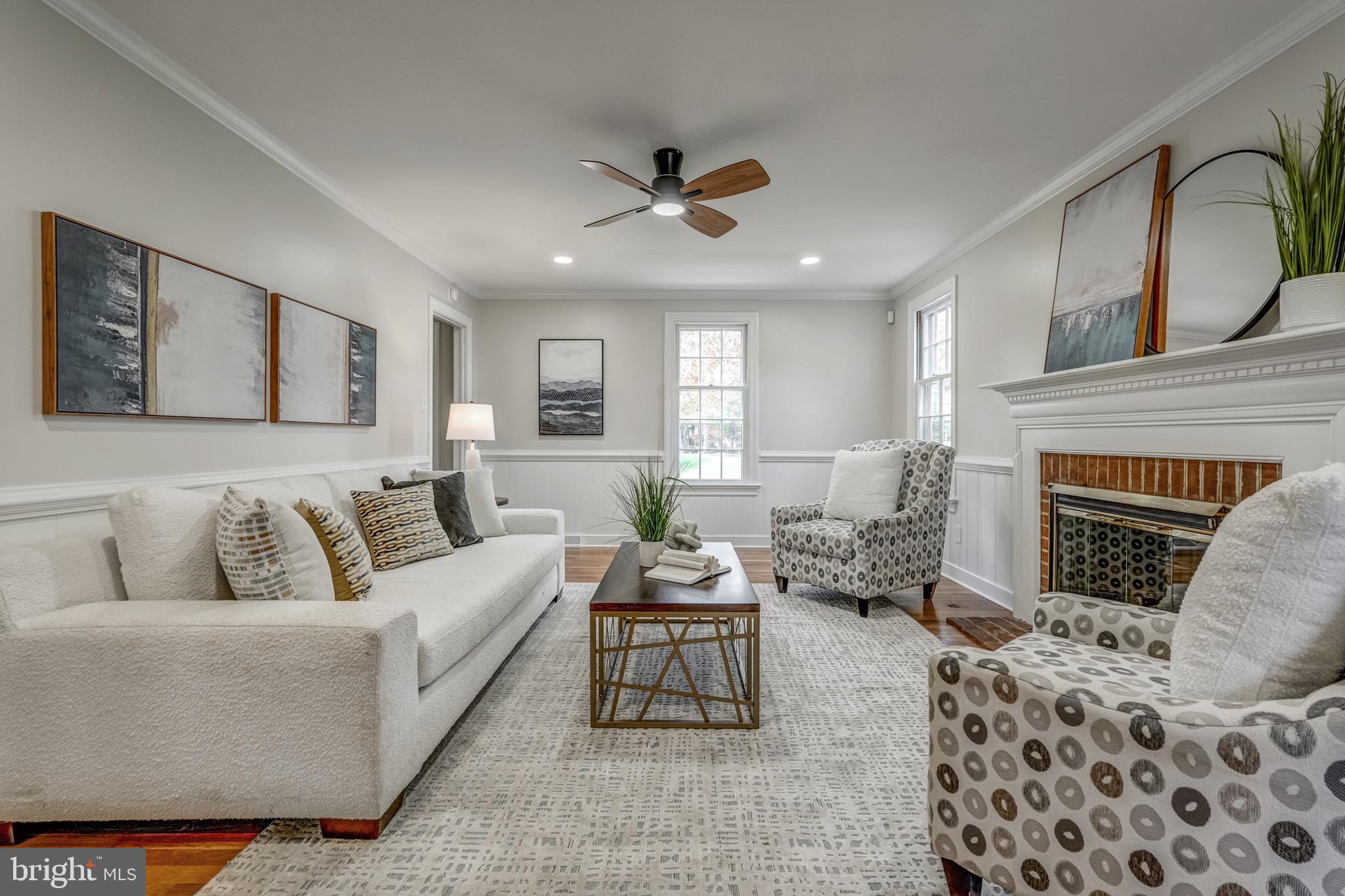 1771 Robindale Road North Chesterfield, VA 23235 - Photo 14 of 67 a living room with furniture and a fireplace