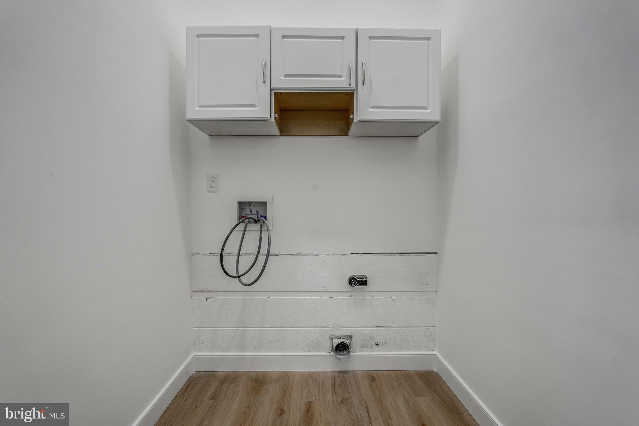 1771 Robindale Road North Chesterfield, VA 23235 - Photo 18 of 67 a view of a room with rack on the wall