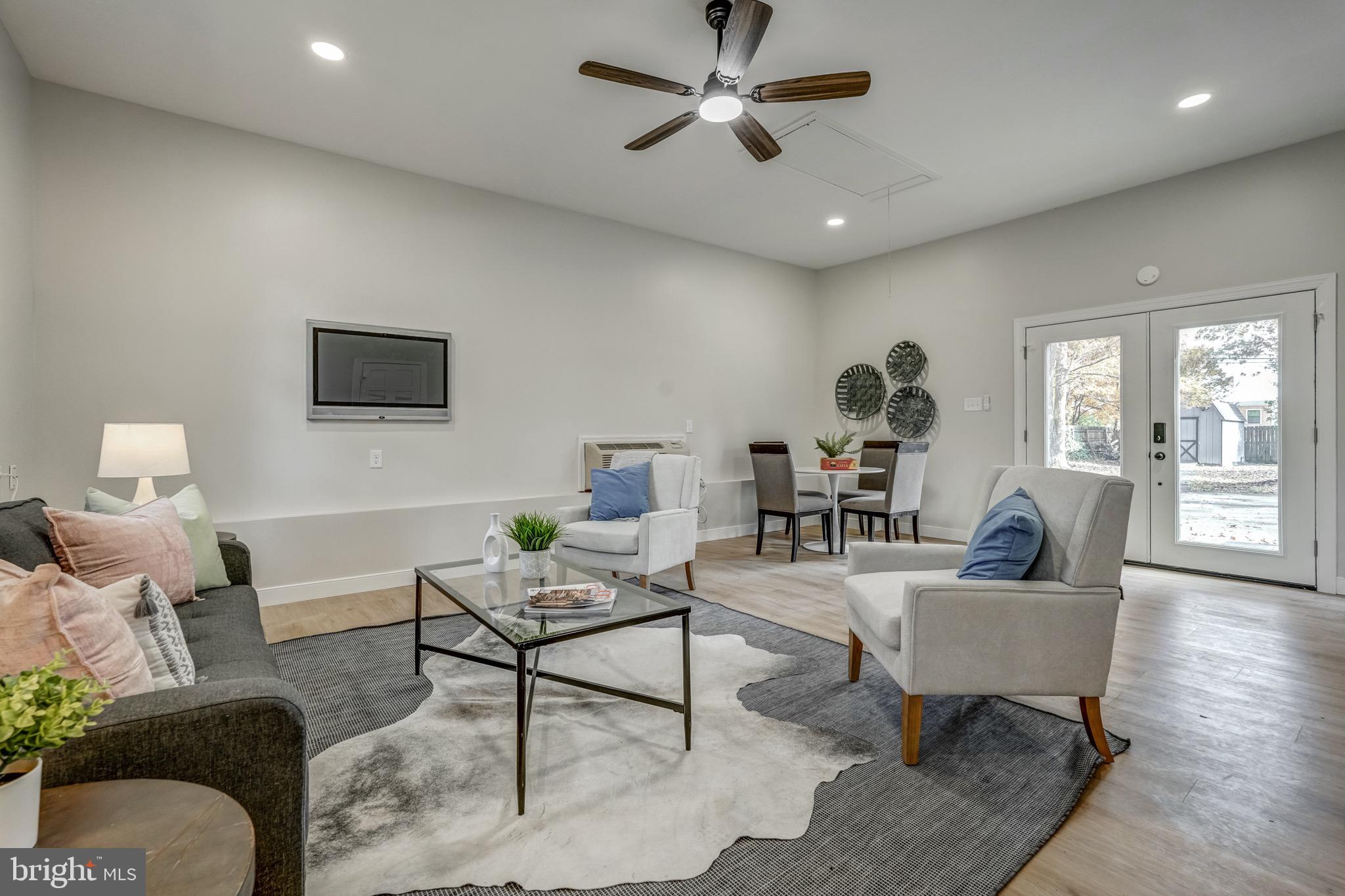 1771 Robindale Road North Chesterfield, VA 23235 - Photo 20 of 67 a living room with furniture and a large window