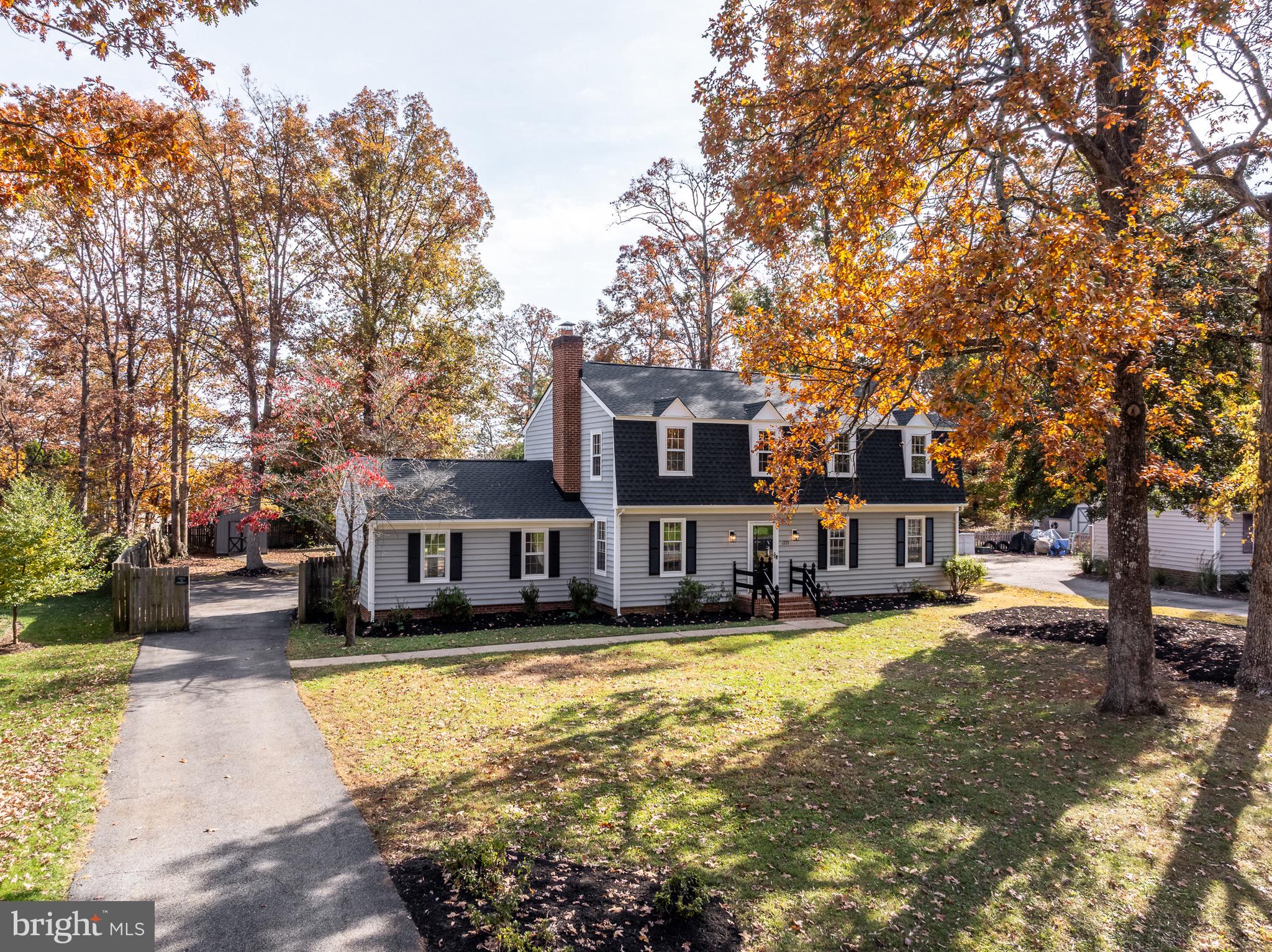 1771 Robindale Road North Chesterfield, VA 23235 - Photo 2 of 67 a view of a house with swimming pool next to a yard