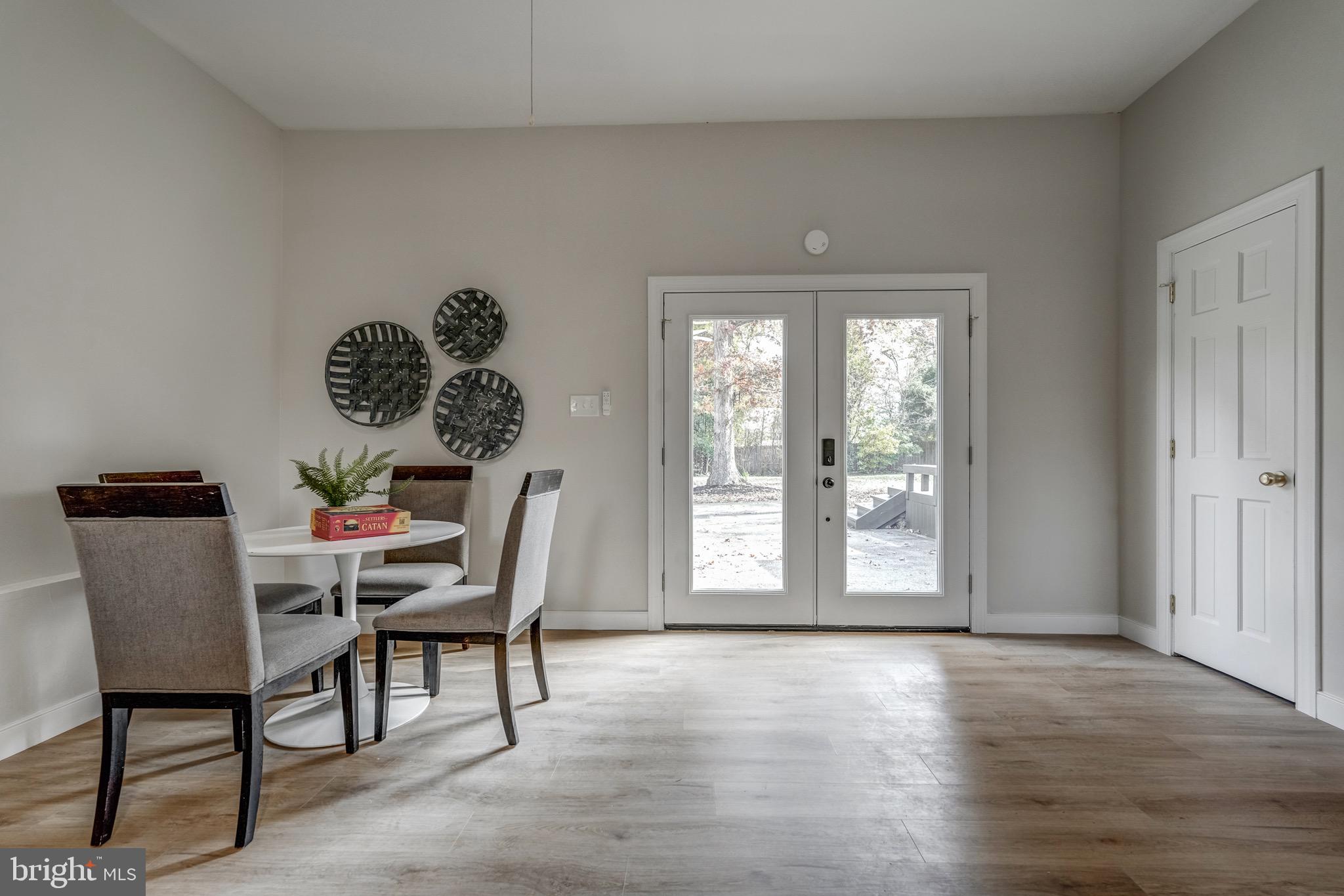 1771 Robindale Road North Chesterfield, VA 23235 - Photo 22 of 67 a dining room with furniture and window